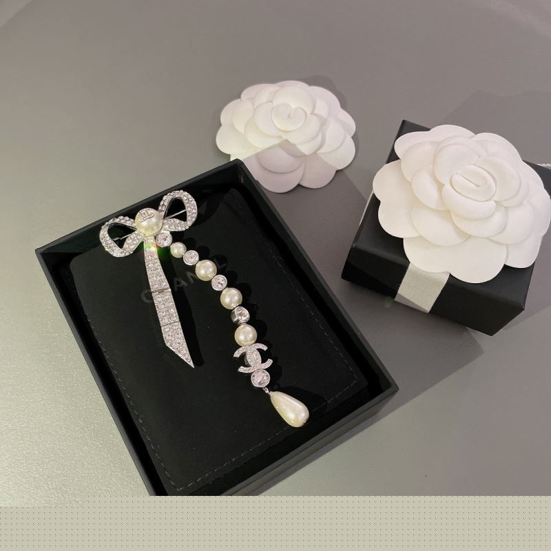 Ch*el brooches
